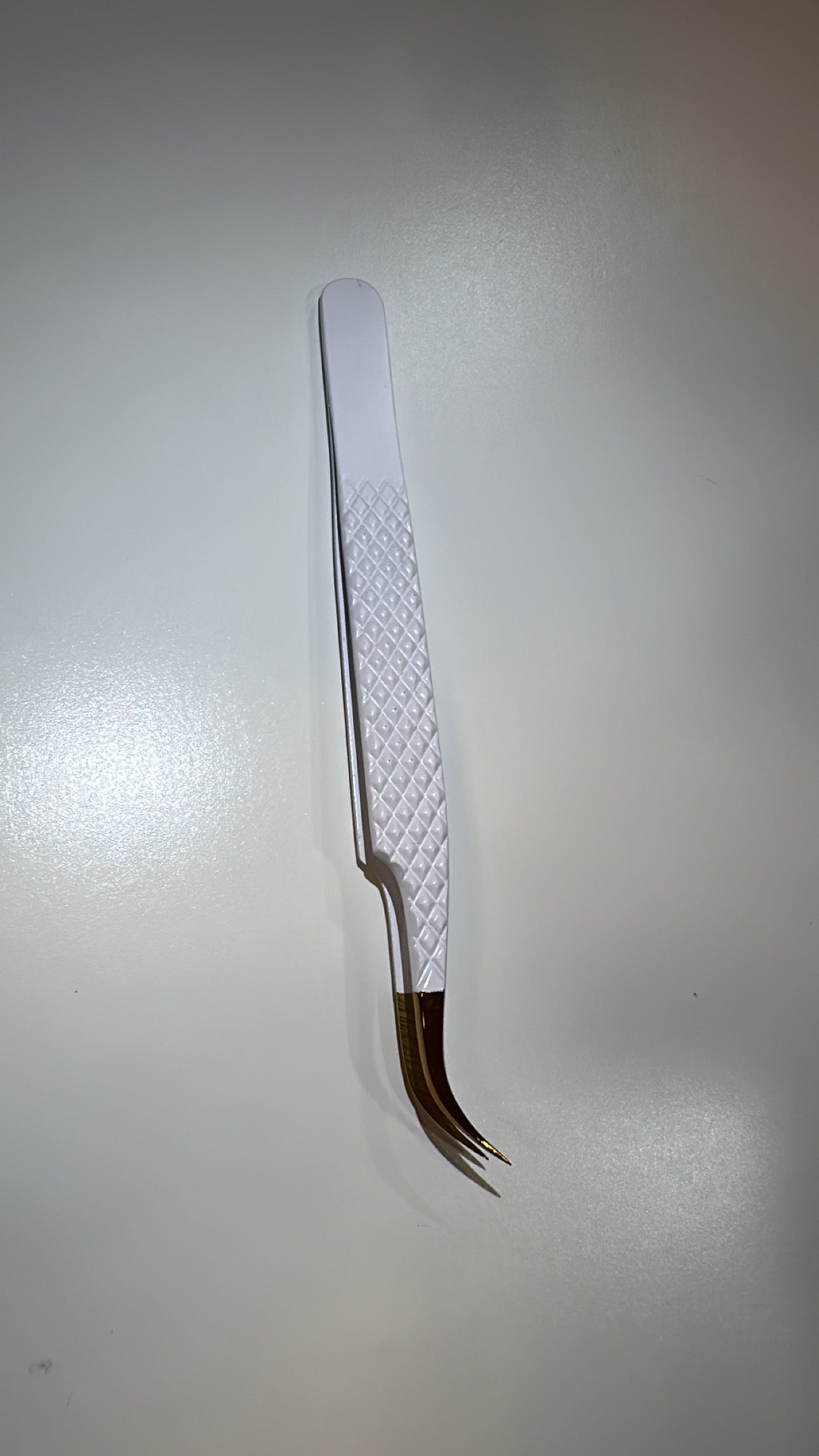 J curved volume tweezer
