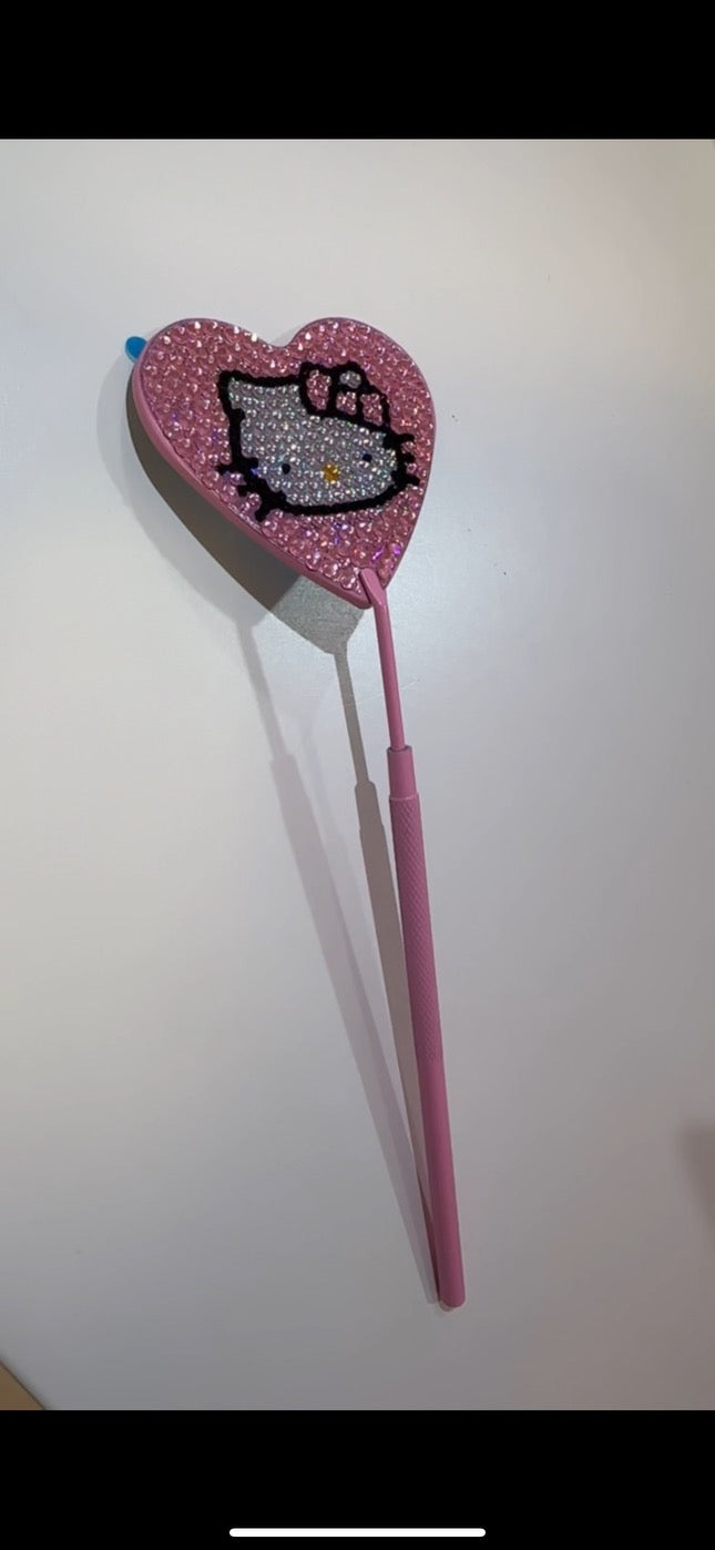 Kitty dental mirror