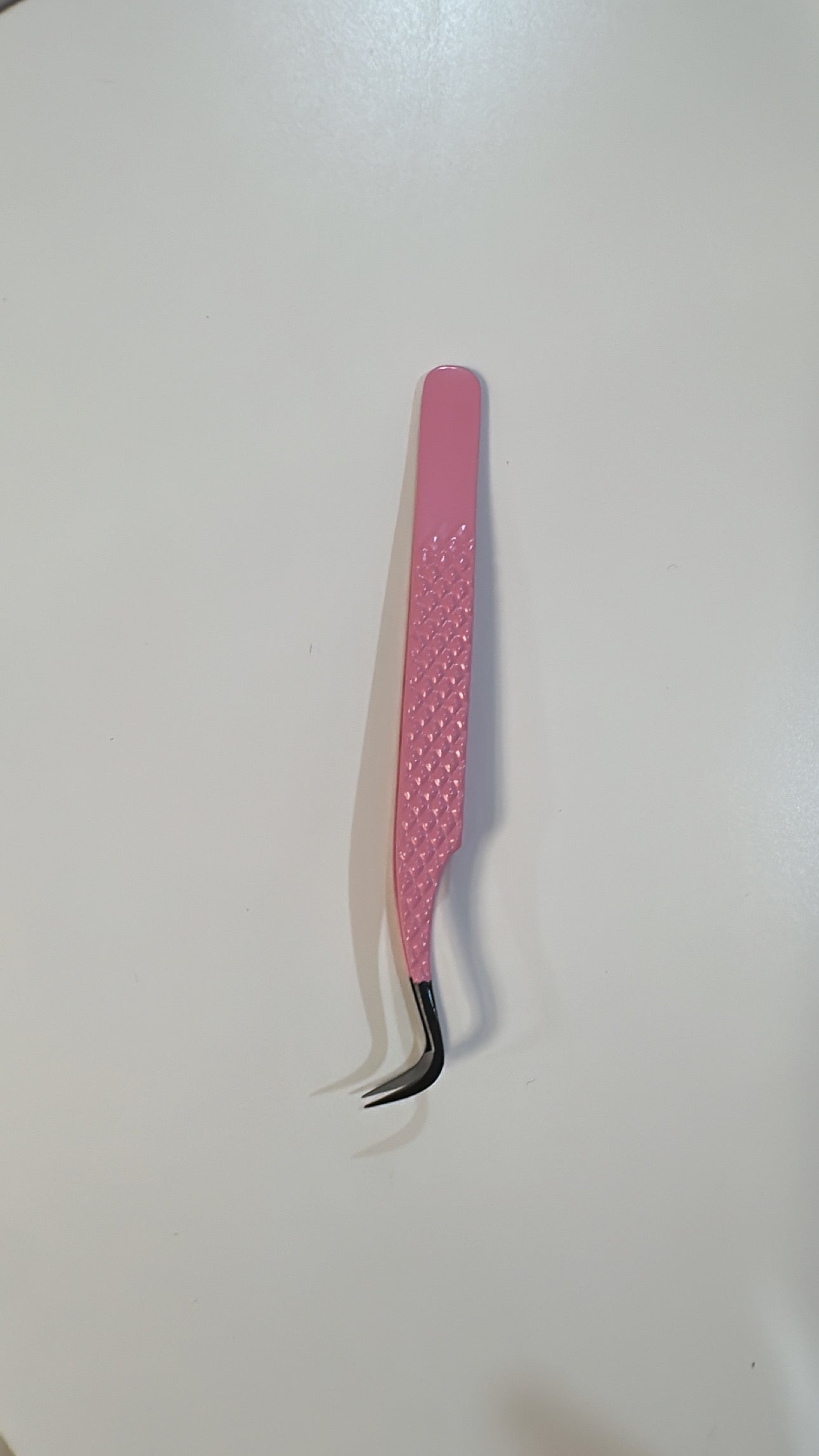 Fanned out volume tweezer