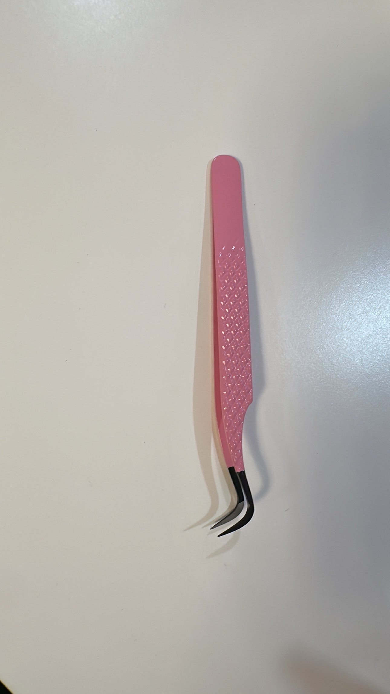 Fanned out volume tweezer