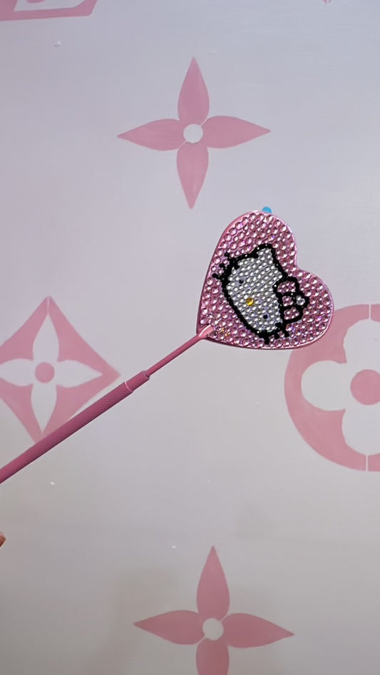 Kitty dental mirror